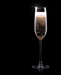 champagne glass on black background