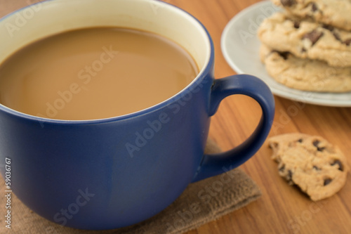 A mug of coffee and chocolate chip cookies