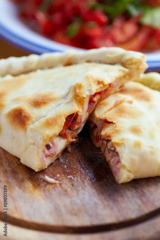 Opened calzone c Opened calzone c
