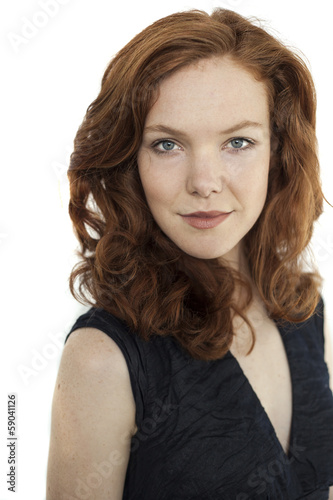 Obraz na płótnie Young Woman with Beautiful Blue Eyes and Red Hair on White Backg w salonie