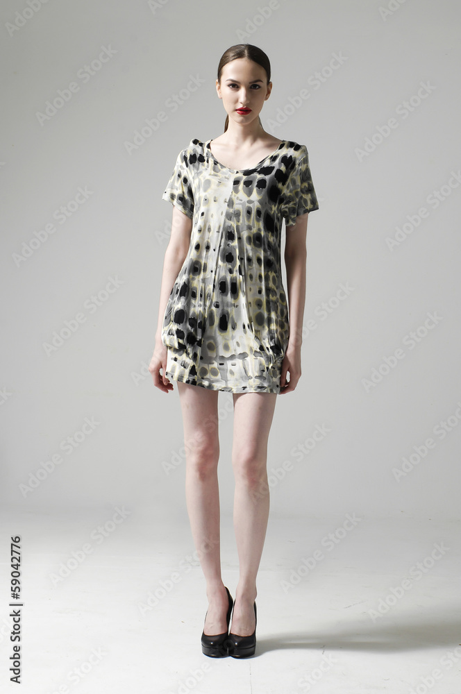 full body The fashionable young woman standing full body The fashionable young woman standing