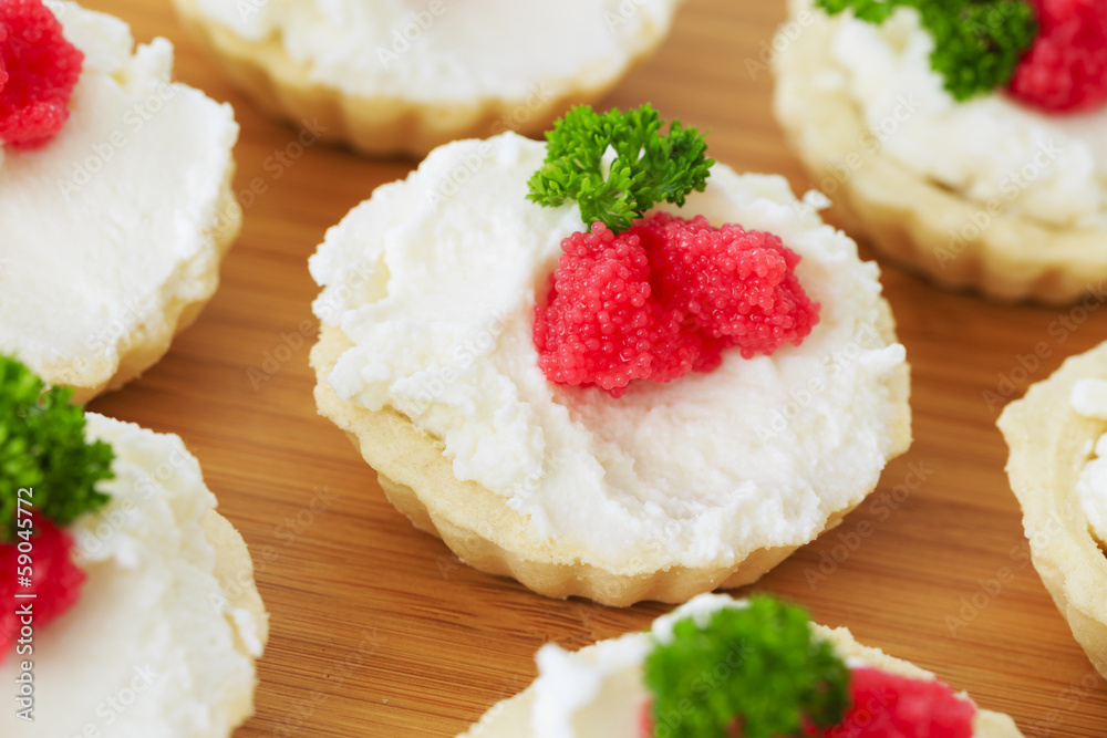 Caviar - appetizer, tartlets with red caviar Caviar - appetizer, tartlets with red caviar
