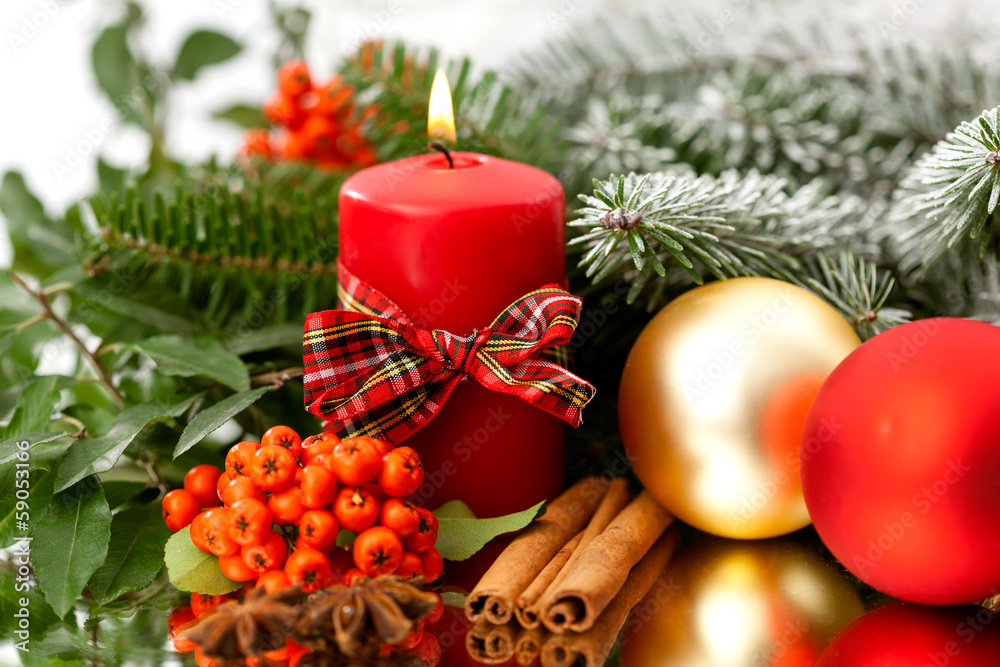 Candle, cinnamon and spruce