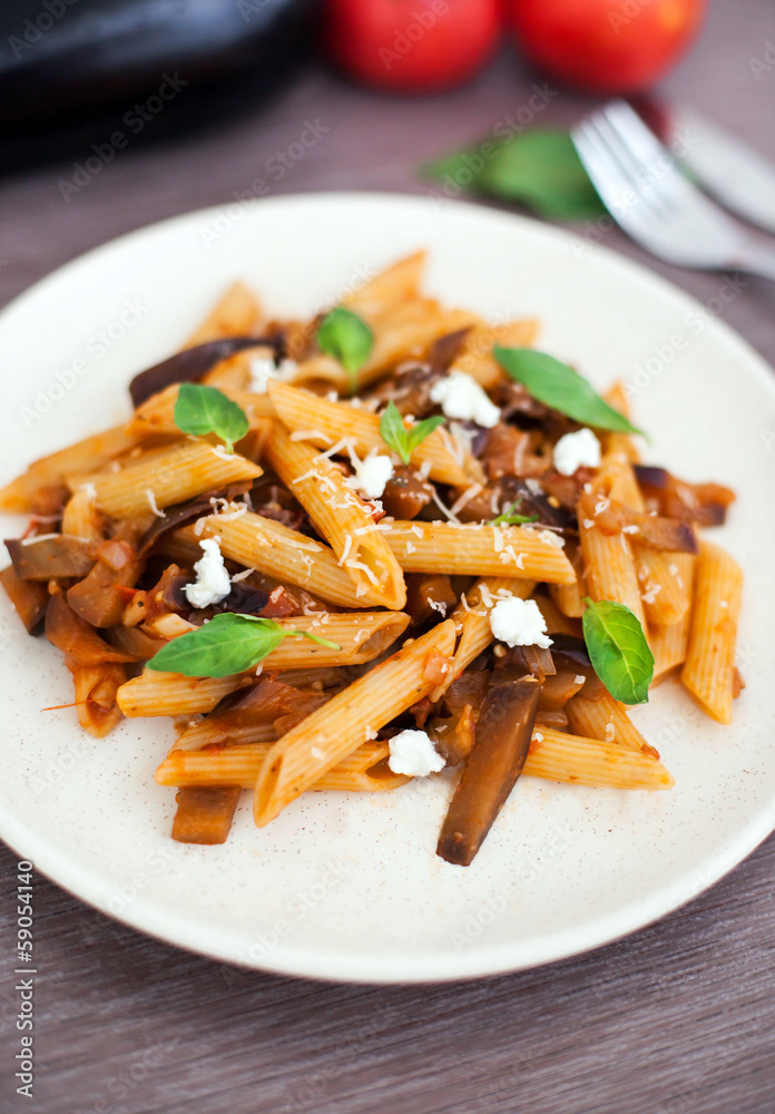 Pasta with tomato sauce, eggplant and ricotta cheese Pasta with tomato sauce, eggplant and ricotta cheese