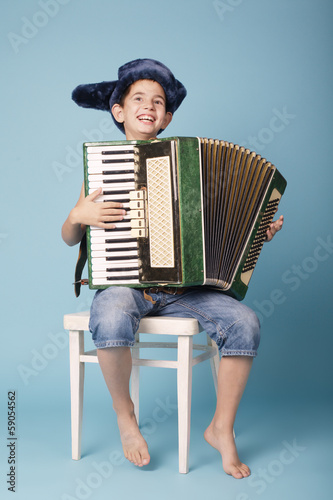 little funny accordion player on blue background