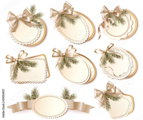 Set of beautiful golden Christmas gift cards with  bows and ribb