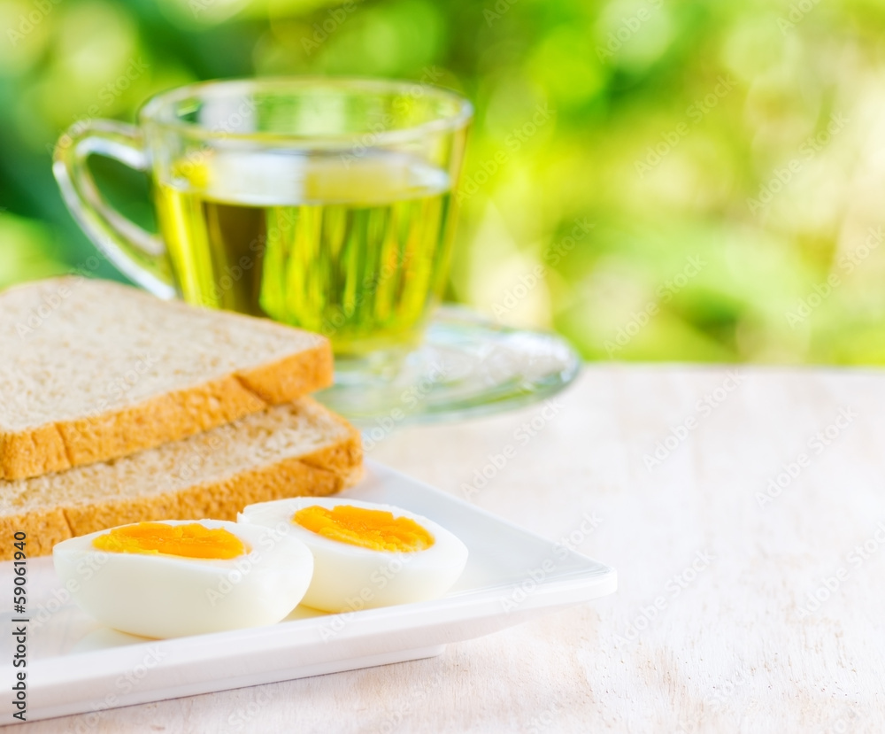 Boiled eggs, toasts and cup of tea. Boiled eggs, toasts and cup of tea.