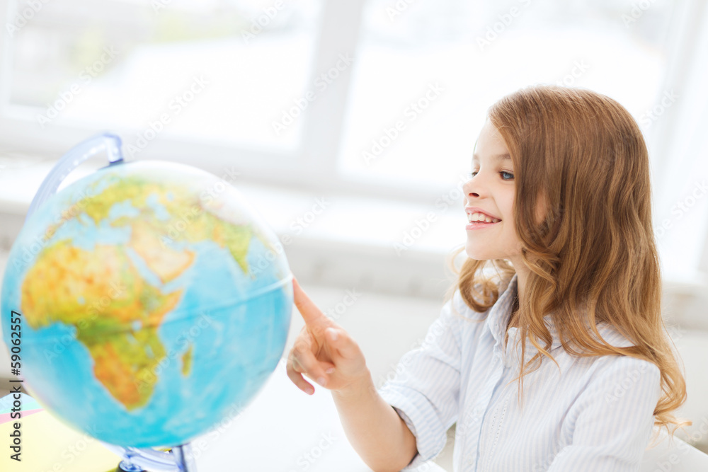 smiling student girl with globe at school smiling student girl with globe at school