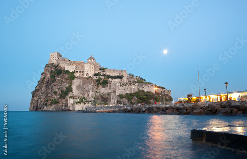 Aragonese Castle in Ischia island by night photo