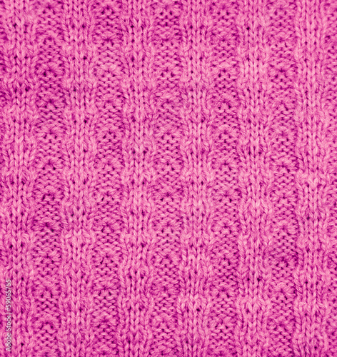 pink knitted fabric as a background. macro