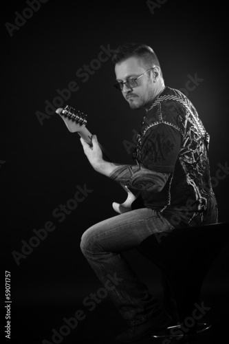 Portrait of guitarist playing
