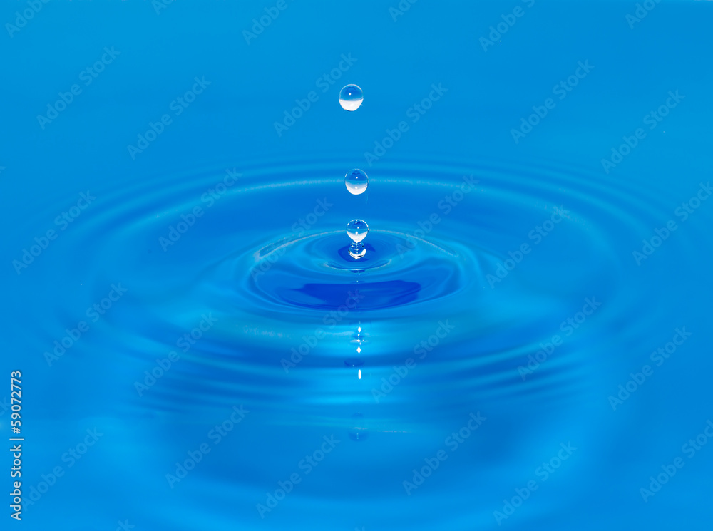 Drop of water in blue Drop of water in blue