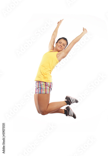 Fitness woman jumping of joy.