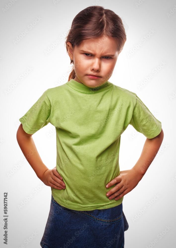 Angry kids evil girl shows fists experiencing anger emotion back Angry kids evil girl shows fists experiencing anger emotion back
