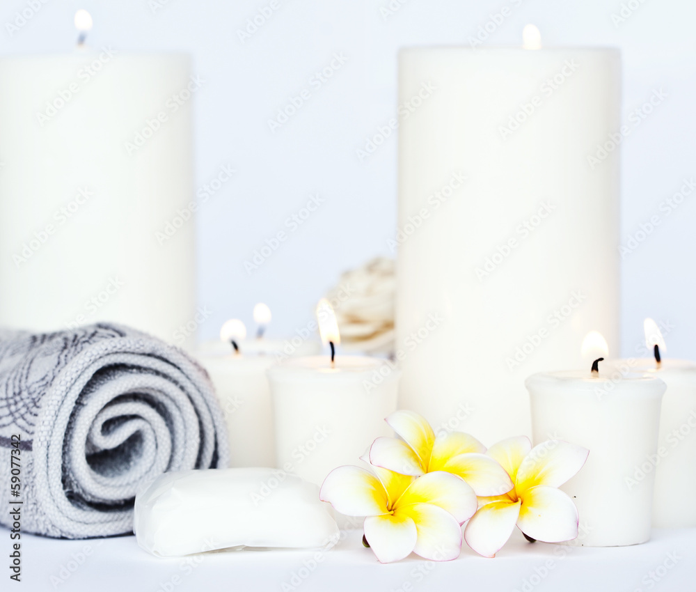 Three Plumeria flower with massage oil and balsam in bowl Three Plumeria flower with massage oil and balsam in bowl