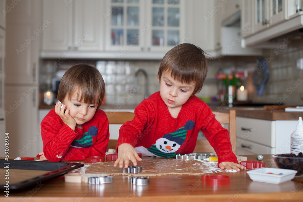 Boys, baking gingerbread cookies Boys, baking gingerbread cookies