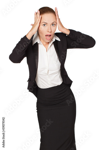 Young girl in a business suit clutching his head.