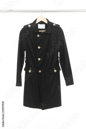 female black coat on hanger