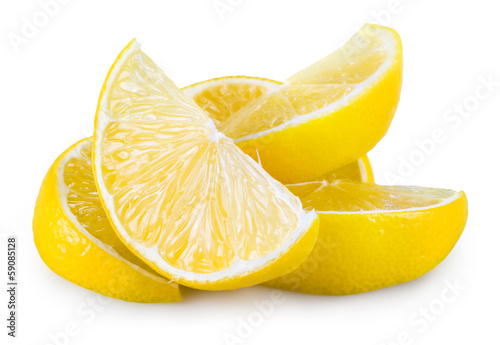 Lemon slices isolated on white. Heap of fruits