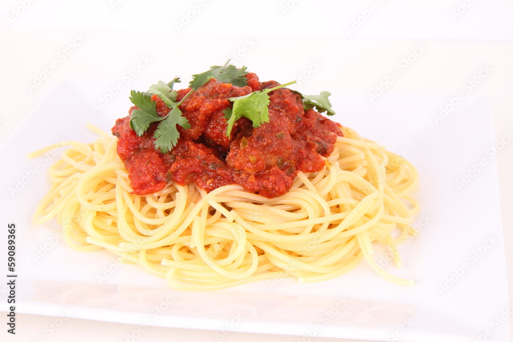 Pasta with meatballs decorated with coriander Pasta with meatballs decorated with coriander
