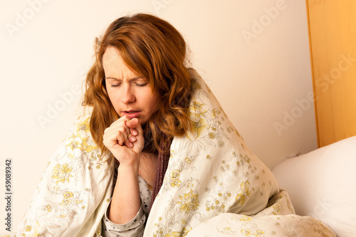Sick woman cough in ved under blanket corona virus covid-19 coronavirus outbreak