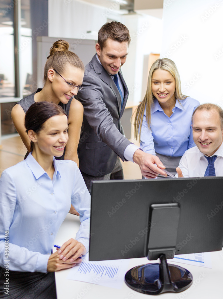 business team with monitor having discussion business team with monitor having discussion
