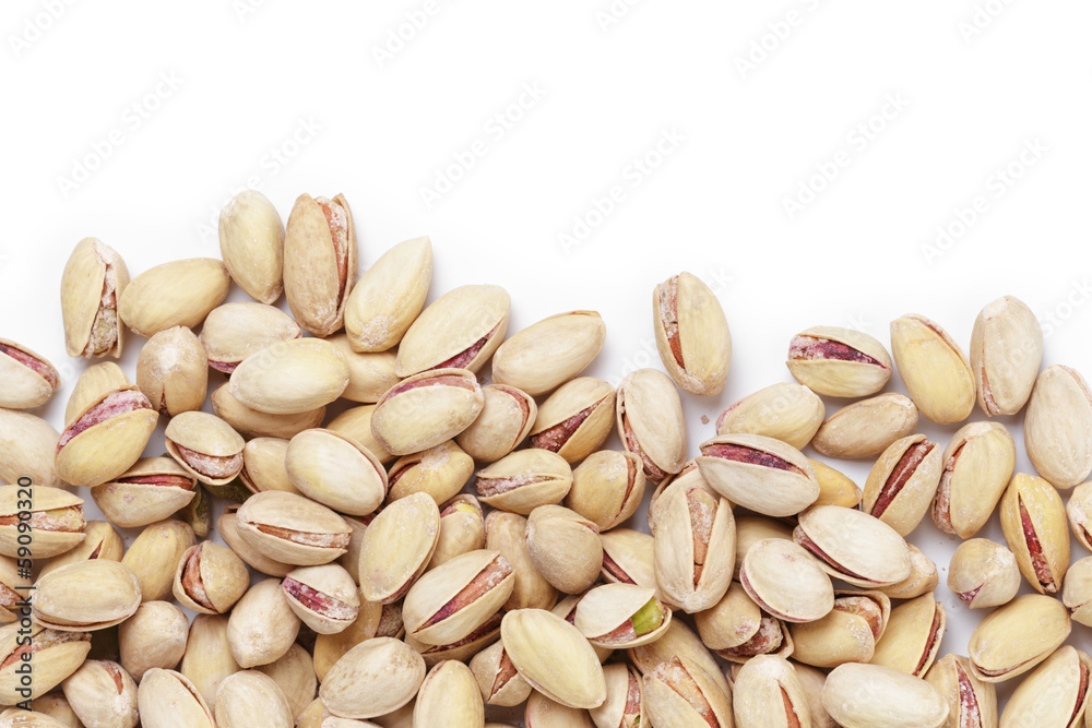 border from roasted salty pistachios nuts border from roasted salty pistachios nuts