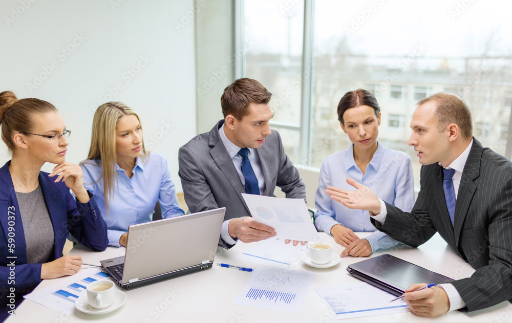 business team with laptop having discussion business team with laptop having discussion