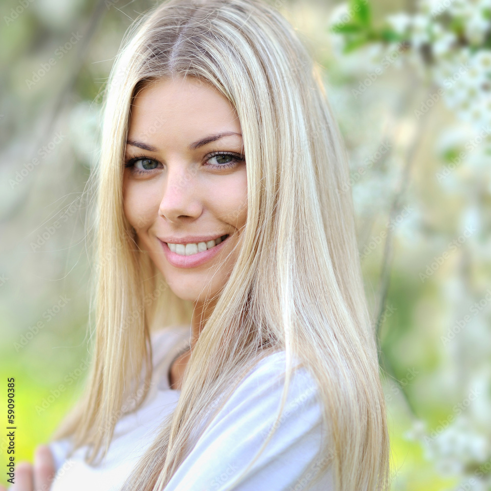 Portrait of young woman smiling Portrait of young woman smiling