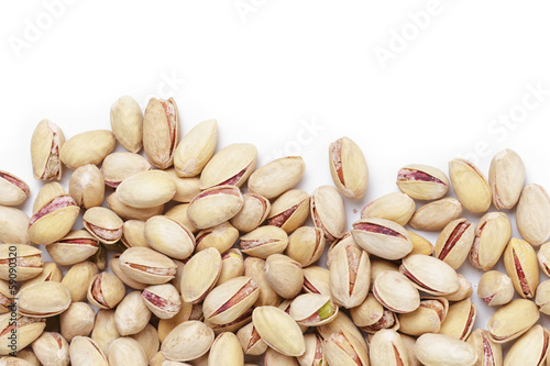 border from roasted salty pistachios nuts