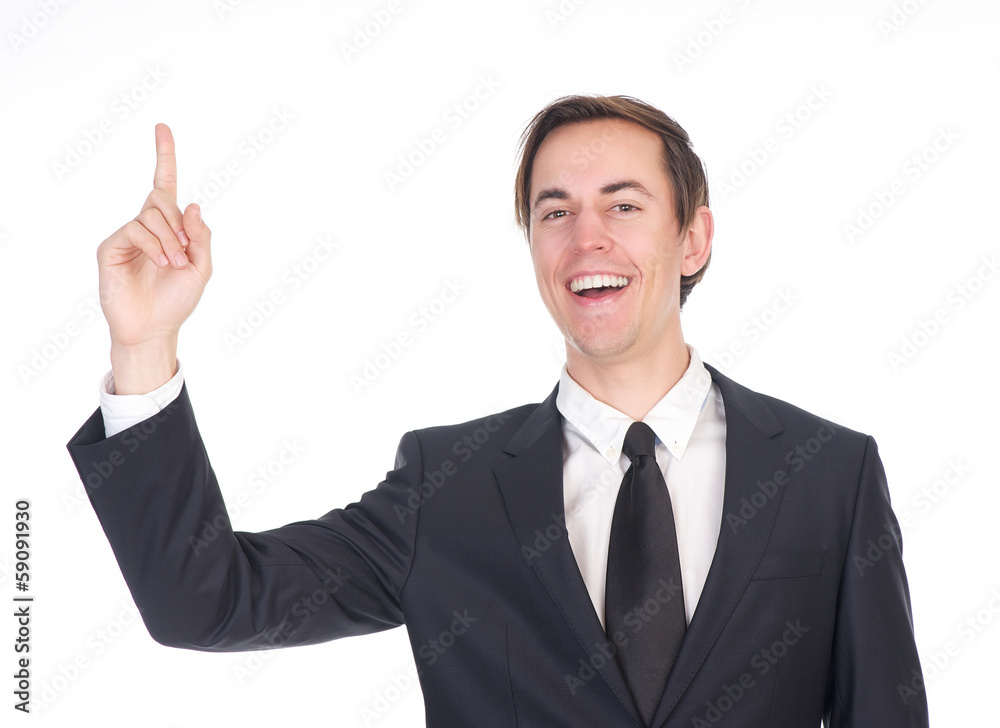 Young businessman smiling and pointing finger Young businessman smiling and pointing finger