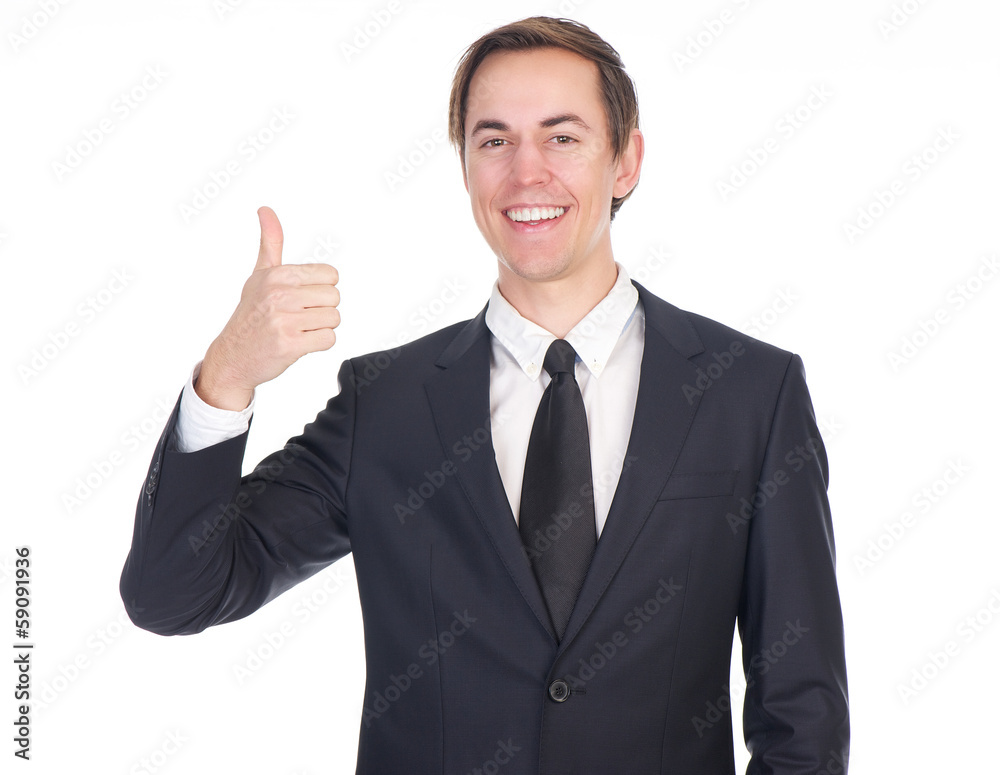 Successful young businessman showing thumbs up Successful young businessman showing thumbs up
