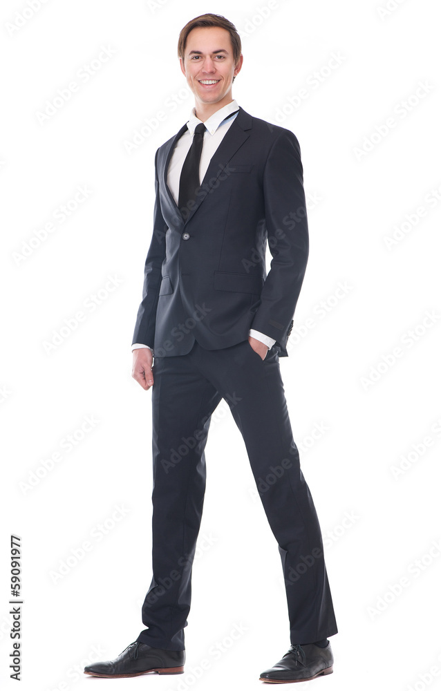 Full body portrait of a smart businessman smiling Full body portrait of a smart businessman smiling