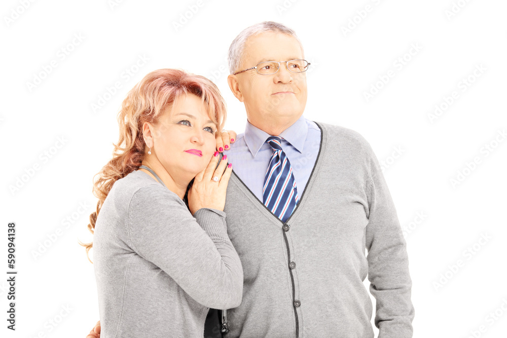 Portrait of loving middle aged couple posing Portrait of loving middle aged couple posing