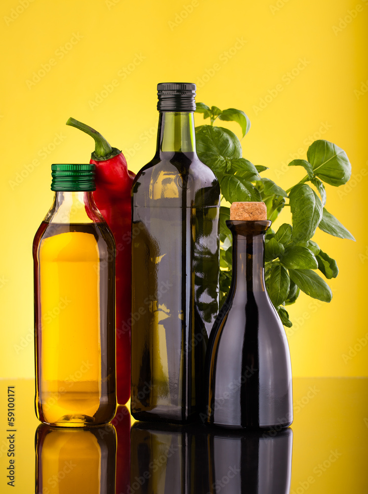 olive oil bottles ,basile and red paprika