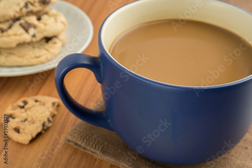 A mug of coffee and chocolate chip cookies