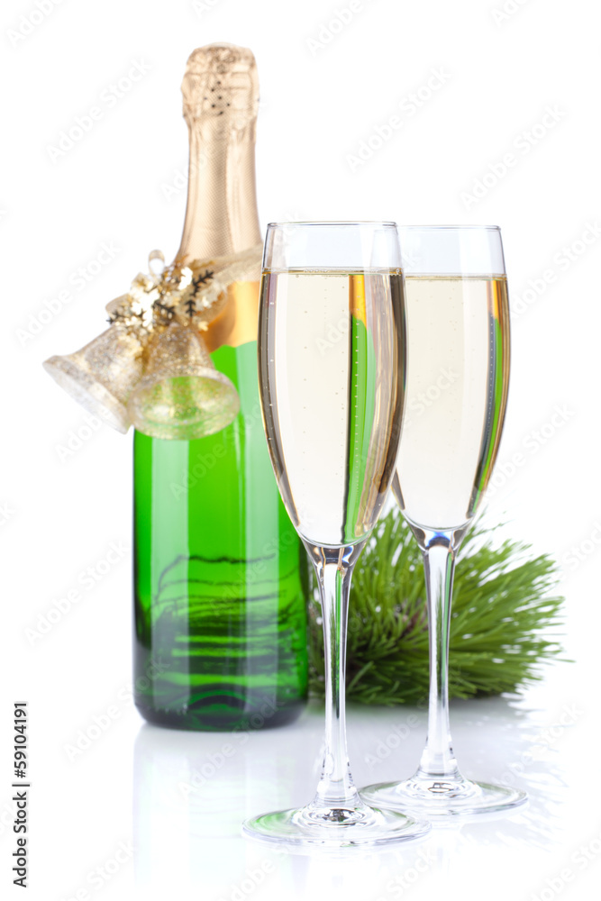 Champagne bottle, glasses and christmas decor Champagne bottle, glasses and christmas decor