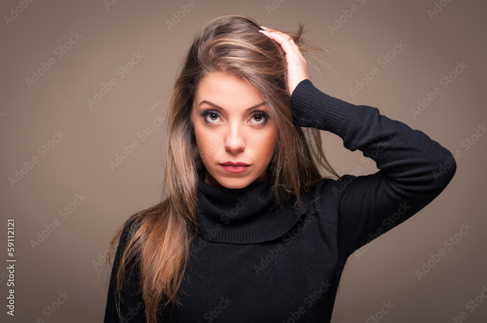 Intimate portrait of woman on dark background. Intimate portrait of woman on dark background.