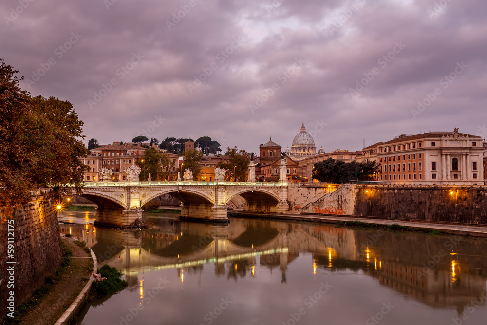 Illuminated Tiber River Embankment and Saint Peter's Cathedral i