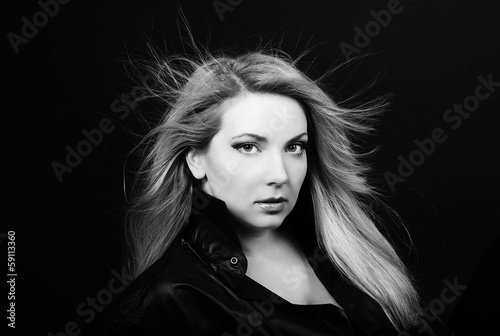 Beautiful girl blonde in  black shirt