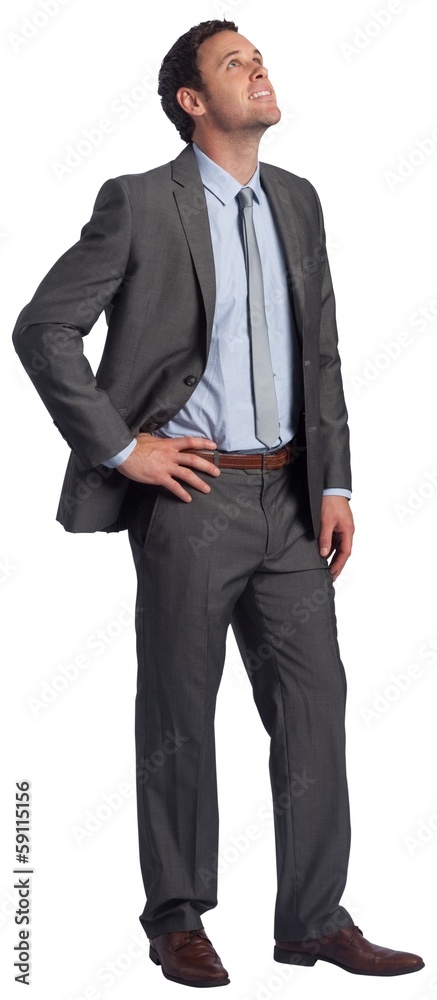 Smiling businessman with hand on hip Smiling businessman with hand on hip
