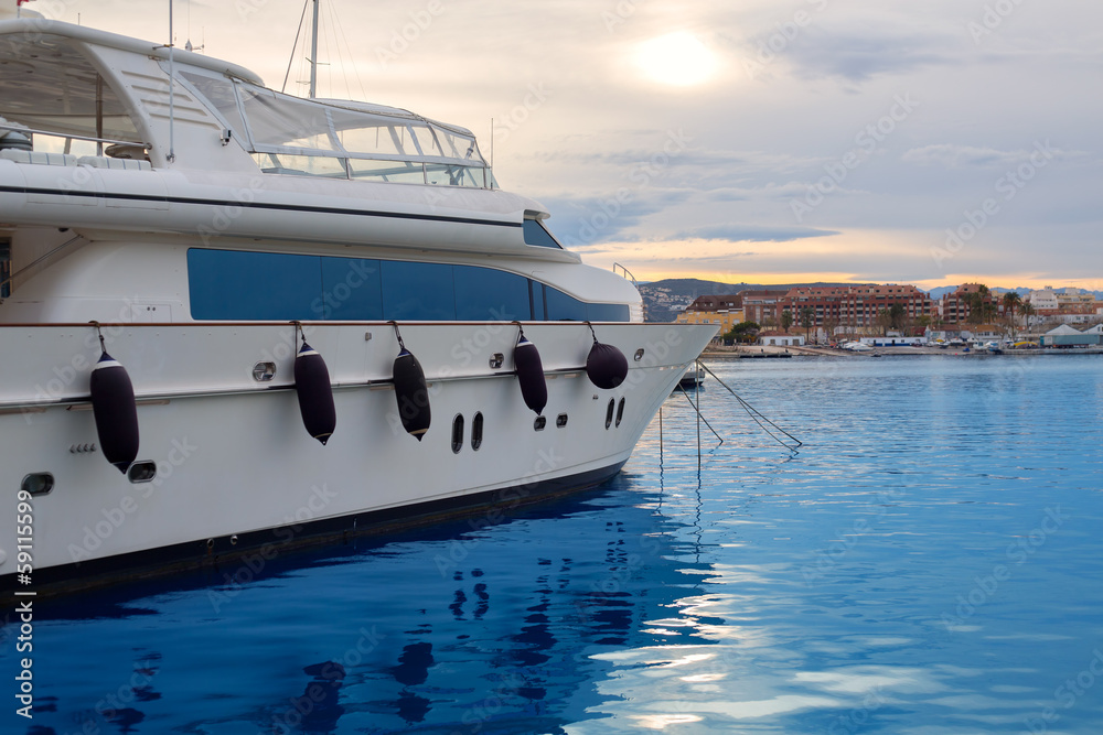 Fototapeta premium Boat moored in Mediterranean marina in Denia Alicante