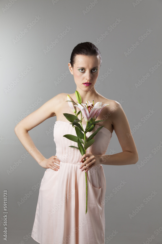 Frau mit einer Lilienblume Frau mit einer Lilienblume