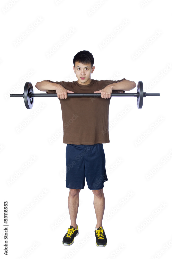 Young sports man with barbell