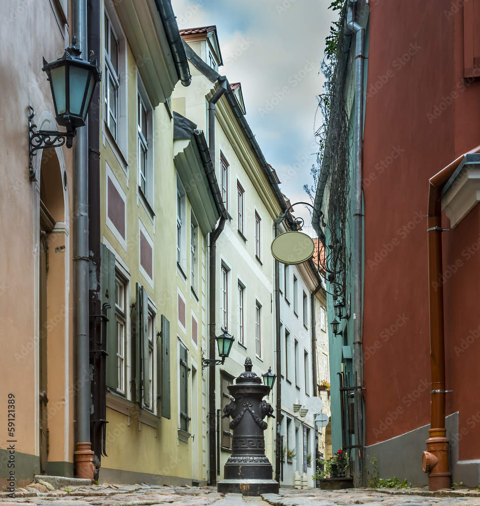 Narrow medieval street in the old Riga city, Latvia, Europe