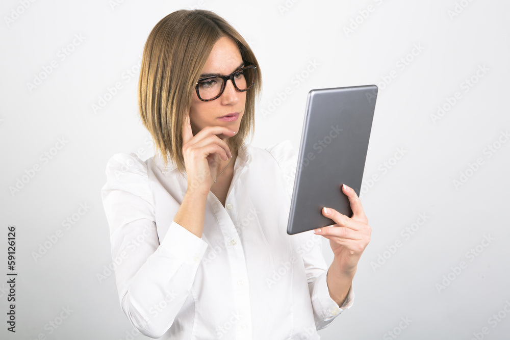 Businesswoman Using Tablet Computer on White Background Businesswoman Using Tablet Computer on White Background
