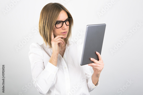 Businesswoman Using Tablet Computer on White Background