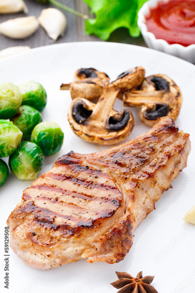 Grilled pork chop with brussels sprouts Grilled pork chop with brussels sprouts