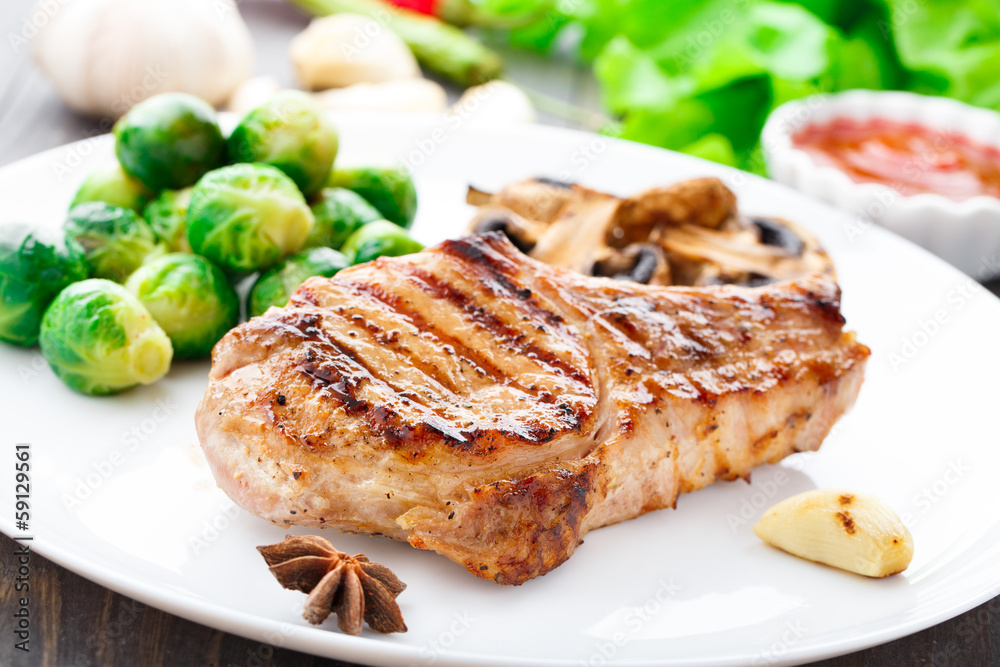 Grilled pork chop with brussels sprouts