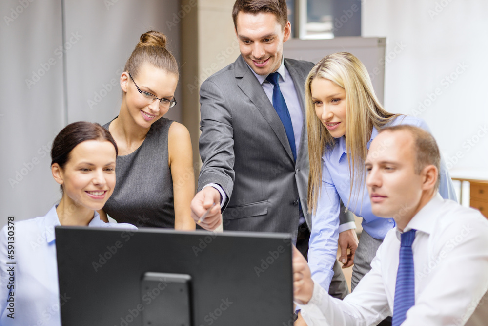 business team with monitor having discussion business team with monitor having discussion